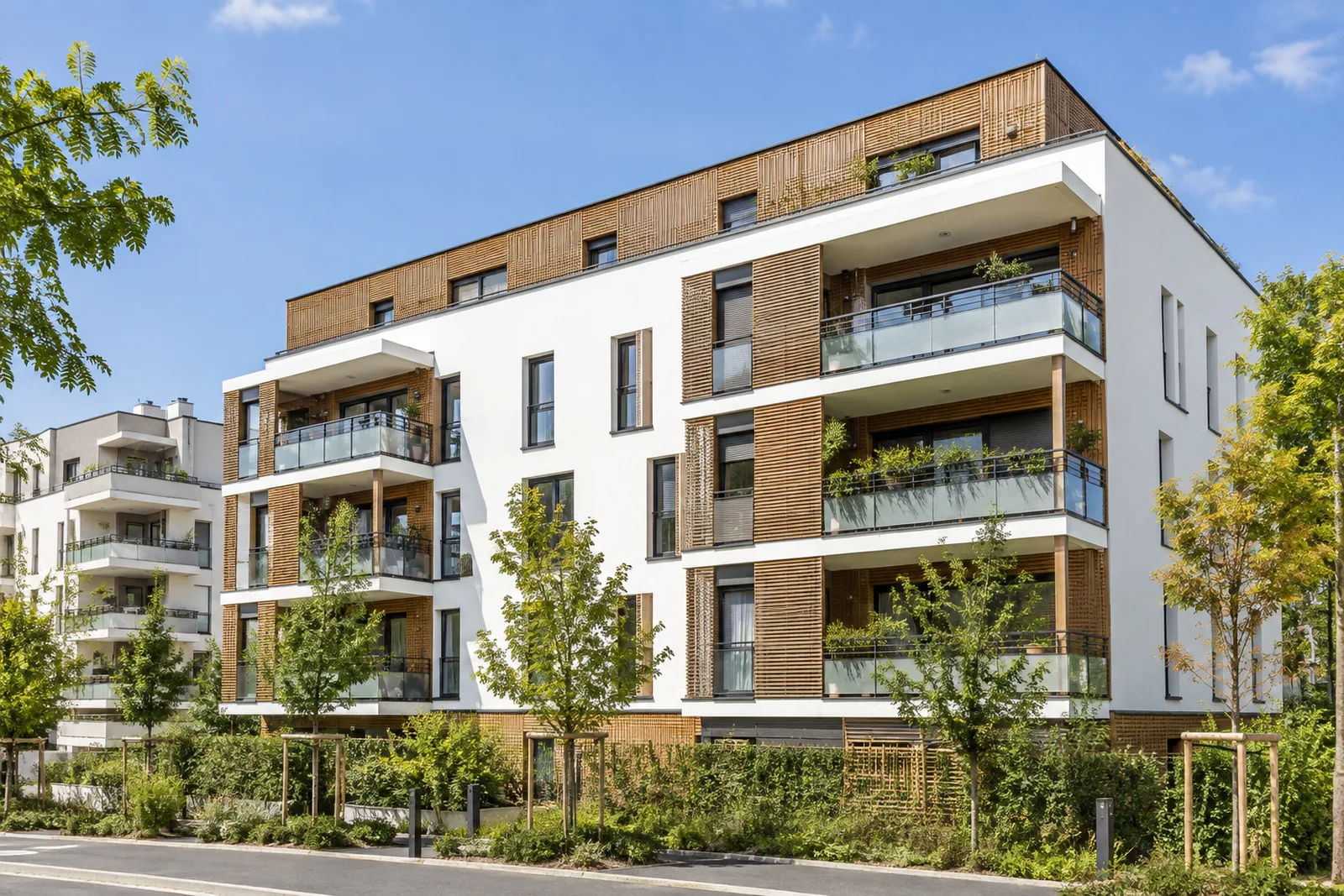 Résidence d’appartements contemporaine, façade claire et bois